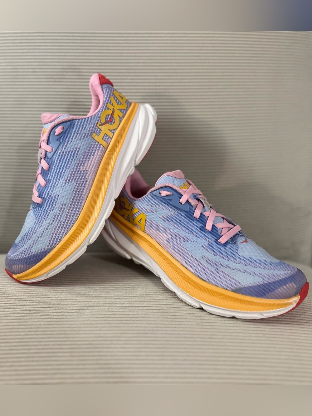 Hoka Women/Youth Clifton 9 in the Peony / Mirage colorway (W6 / Y 4.5)